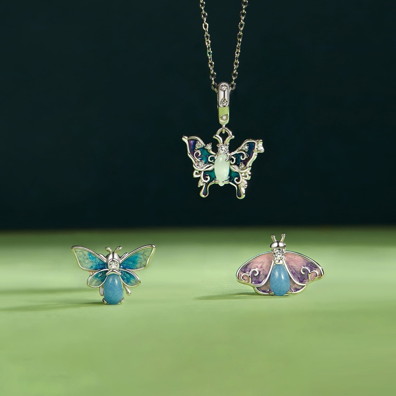 Zawieszka charms ze srebra świecąca w ciemności - Fioletowo-niebieski motyl