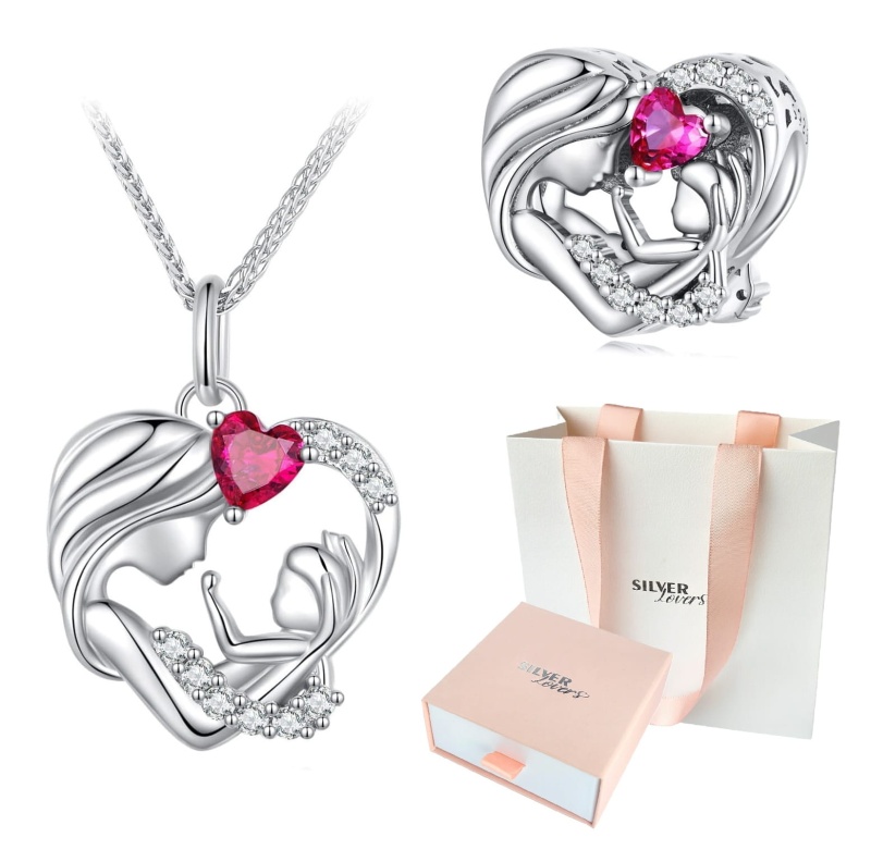 Komplet biżuterii ze srebra - Mama i córka srebro 925. Zestaw zawiera naszyjnik z zawieszką mama i córka z różową cyrkonią i charms do Pandora z tym samym motywem i cyrkonią. Zestaw zawiera również pudełko prezentowe i torebkę na prezent.