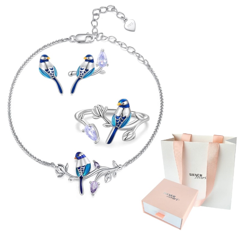 Komplet biżuterii ze srebra - Zielone ptaki zimorodki srebro 925. Zestaw zawiera kolczyki z zimorodkiem, regulowany pierścionek z zimorodkiem i regulowaną bransoletkę z zimorodkiem. Zestaw zawiera również pudełko prezentowe i torebkę na prezent.